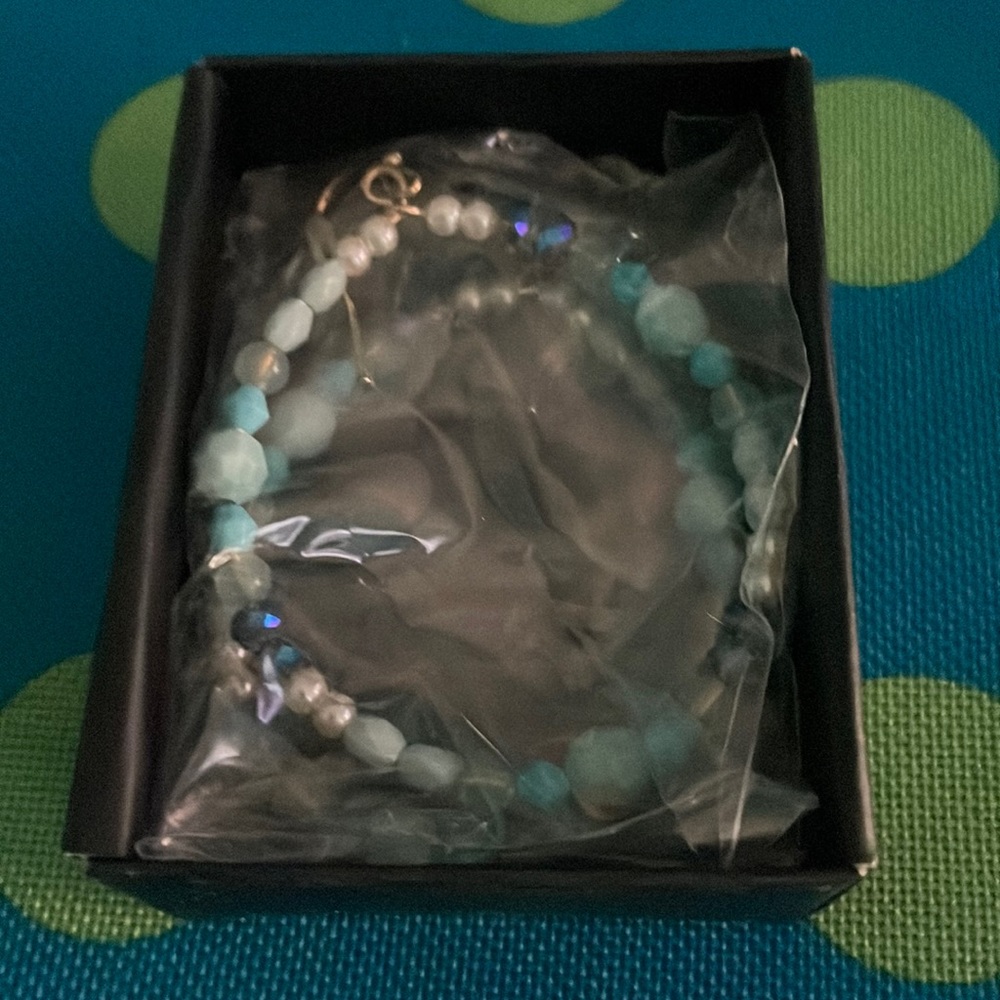 Avon golden mustang hoop earrings.